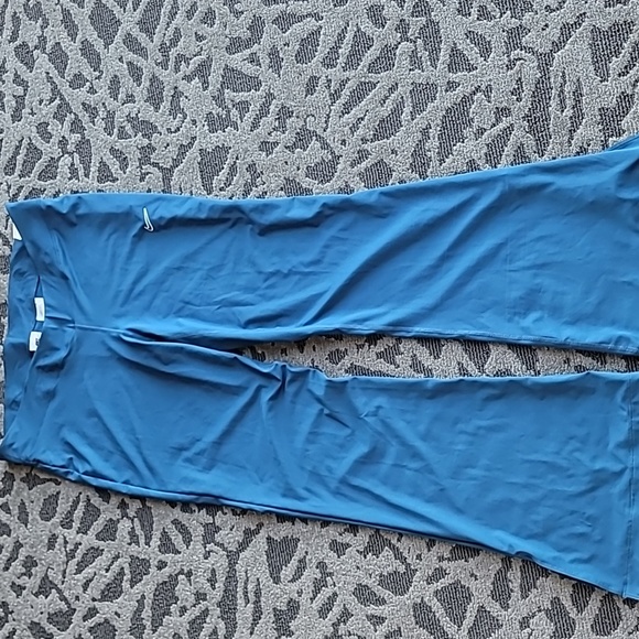 NEW w/tag NIKE TIGHT FIT MID RISE LEGGINGS with FLARE BOTTOM - Picture 2 of 7